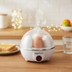 amazon basics Electric Egg Boiler | 350 Watt | Boils Upto 7 Eggs | Automatic Operation, 3 Boiling Modes | Overheat Protection | Stainless Steel Heating Plate, Measuring Cup | 75ml | Plastic | White - Image 2