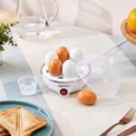 amazon basics Electric Egg Boiler | 350 Watt | Boils Upto 7 Eggs | Automatic Operation, 3 Boiling Modes | Overheat Protection | Stainless Steel Heating Plate, Measuring Cup | 75ml | Plastic | White - Image 3